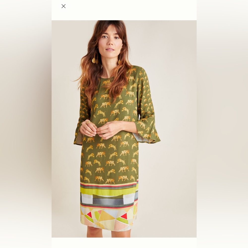 Green animal print mini dress with geometric pattern and 3/4 bell sleeves